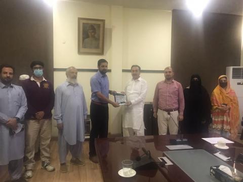 Handing over of working document to chairman of PTB regarding use of GIS technology for tobacco crop estimation on 30th August, 2021